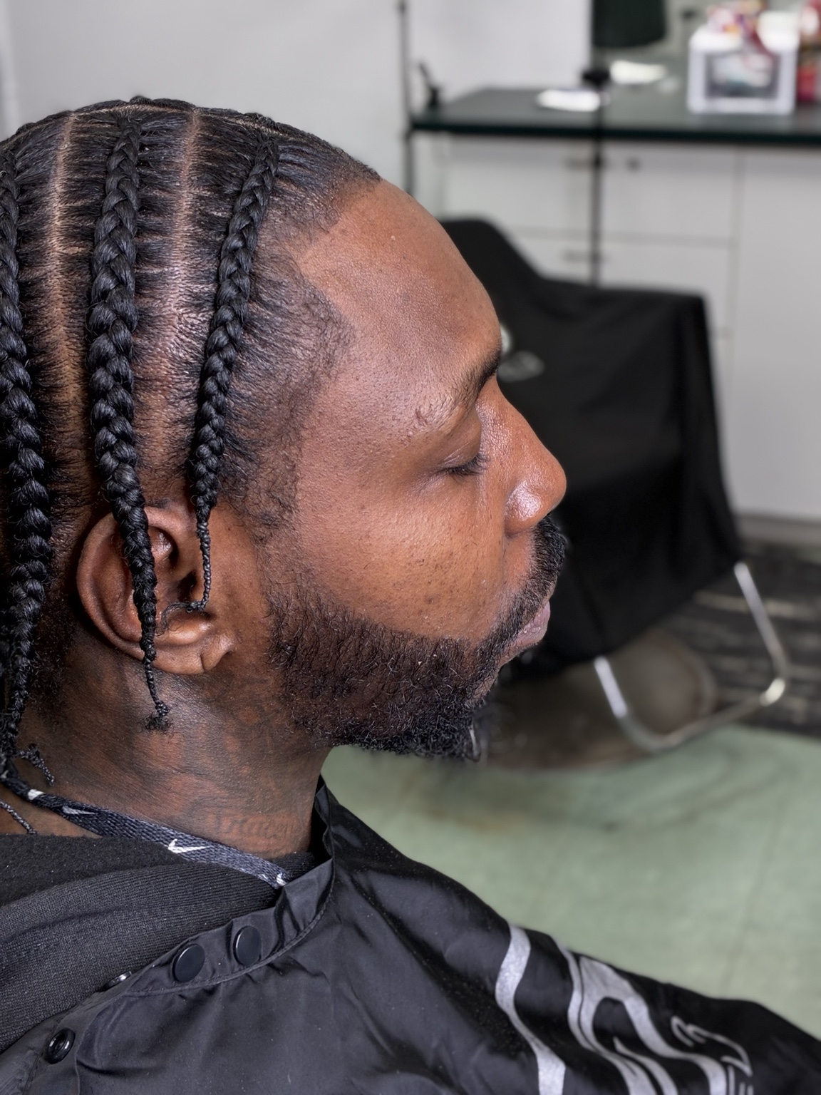 Phill beard and braids style