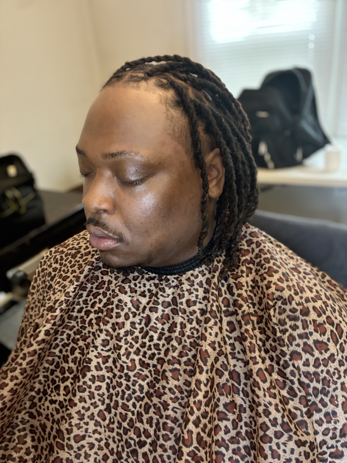 Loc and grooming service by Mariah